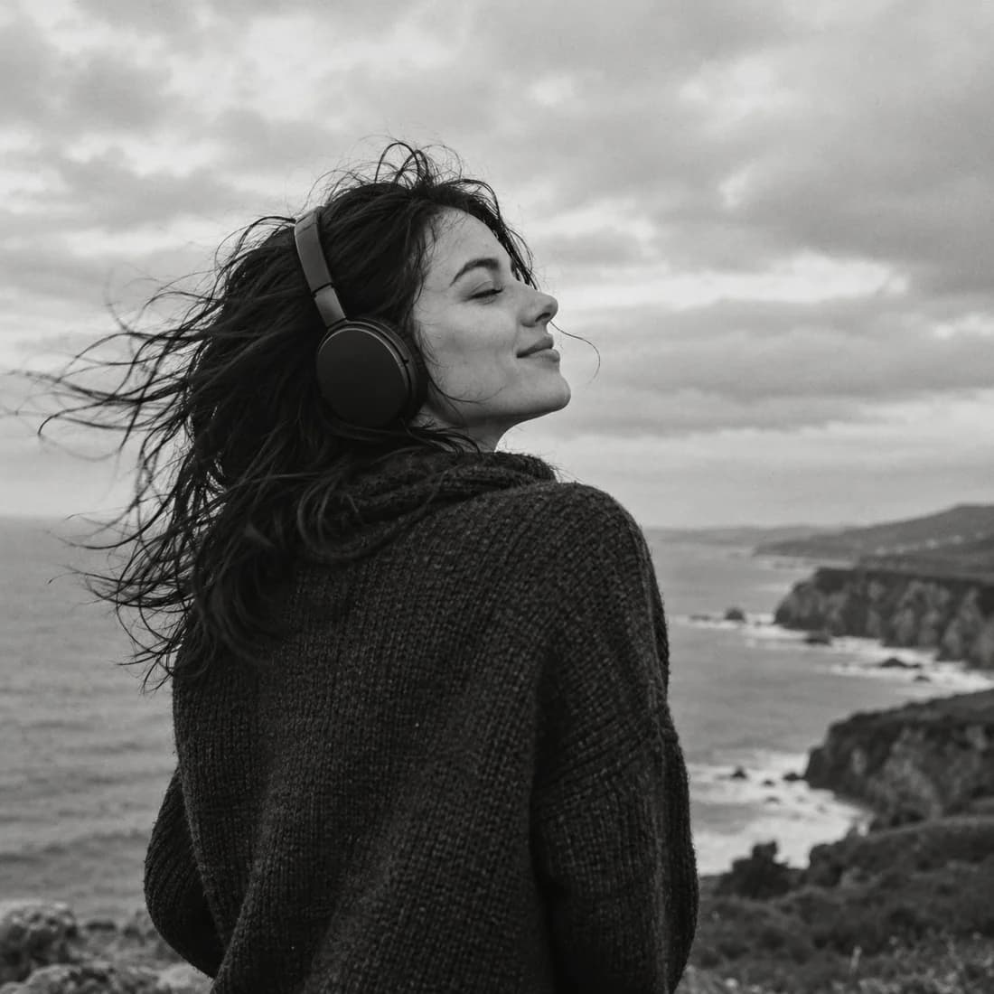 A listener enjoying music through headphones